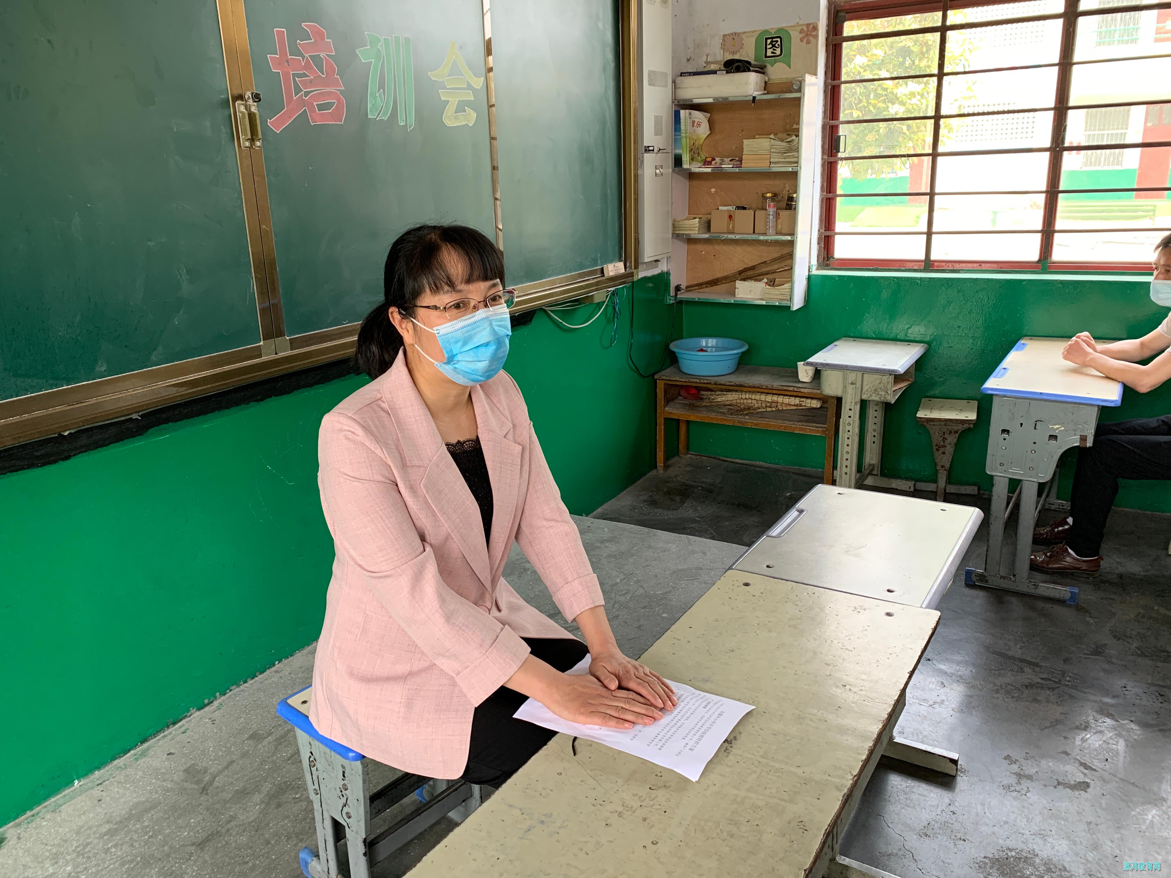 春风伴暖阳盼学子归学堂朱耀环小学再次开展疫情防控开学演练